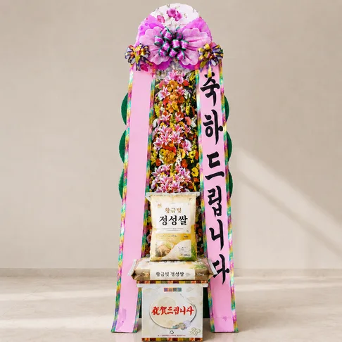 달자네꽃배달 쌀화환 20kg 119,000원. 10kg과 같은 꽃탑 형태이며 아래에 올리는 쌀이 20kg으로 늘어 받침 부분이 더 두툼하고 높아 보인다.